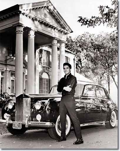 Elvis with his Rolls Royce in front of Graceland