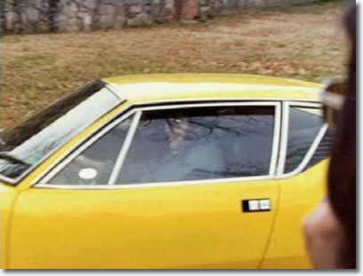 Elvis driving his De Tomaso Pantera