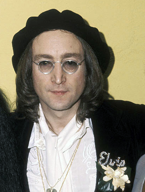 John Lennon wearing his Elvis pin. 